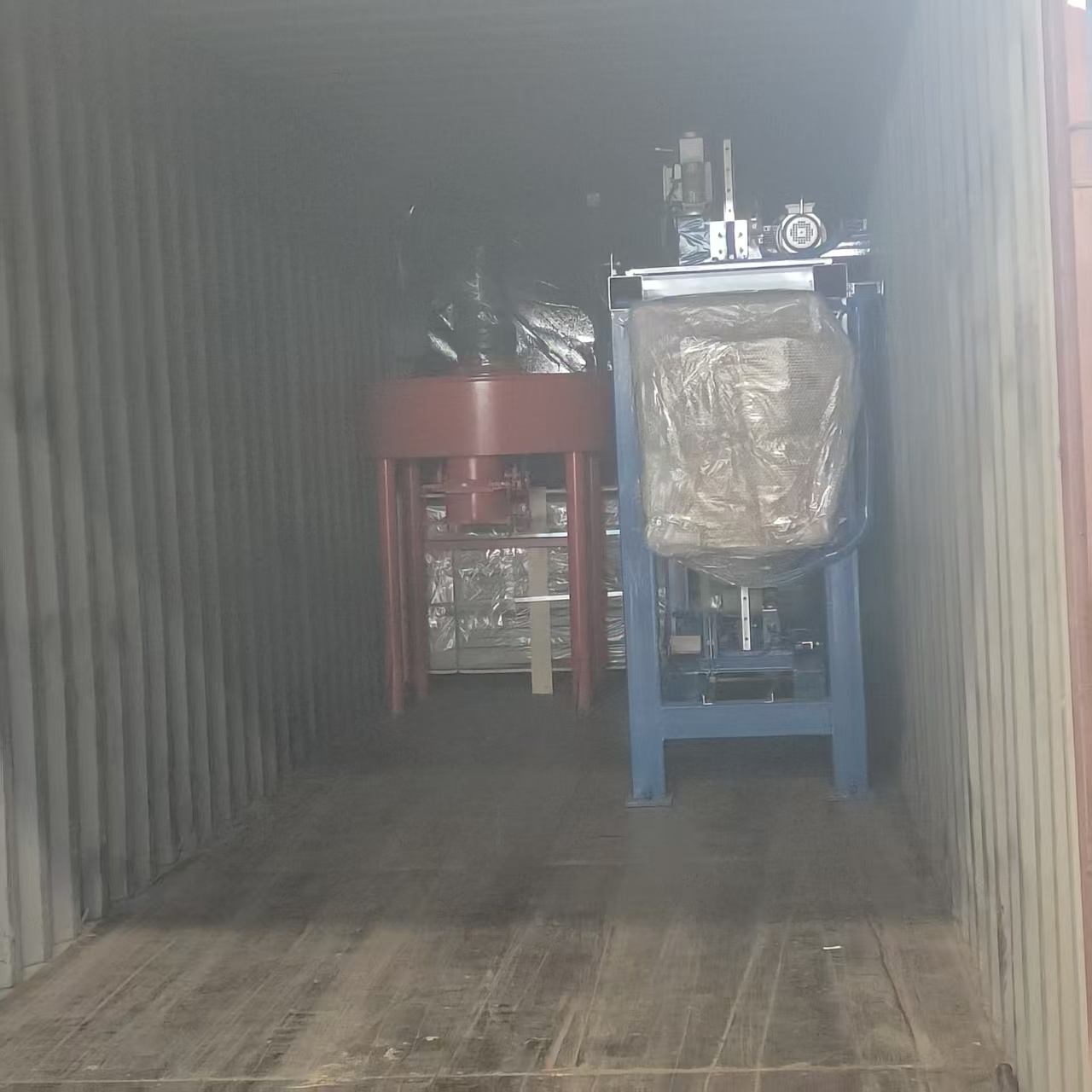 Colored tile hydraulic press in operation