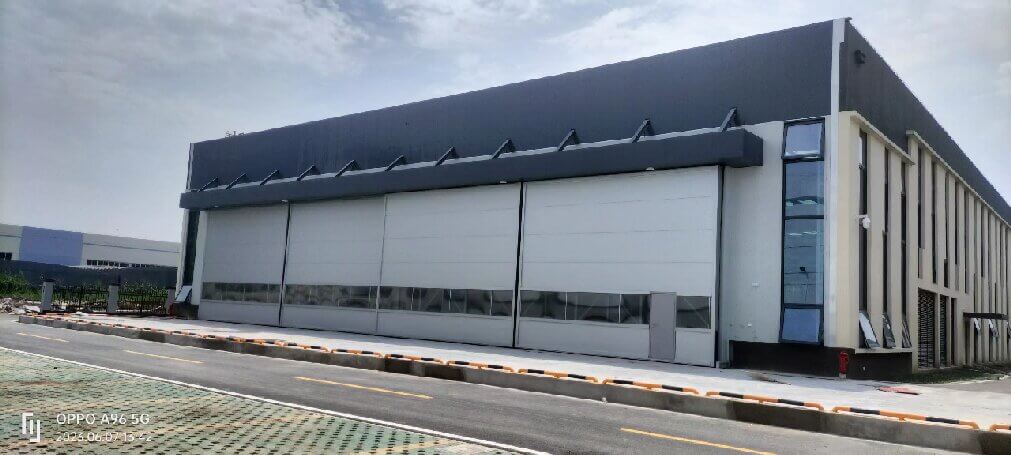Large hangar door: Suzhou small airport hangar door